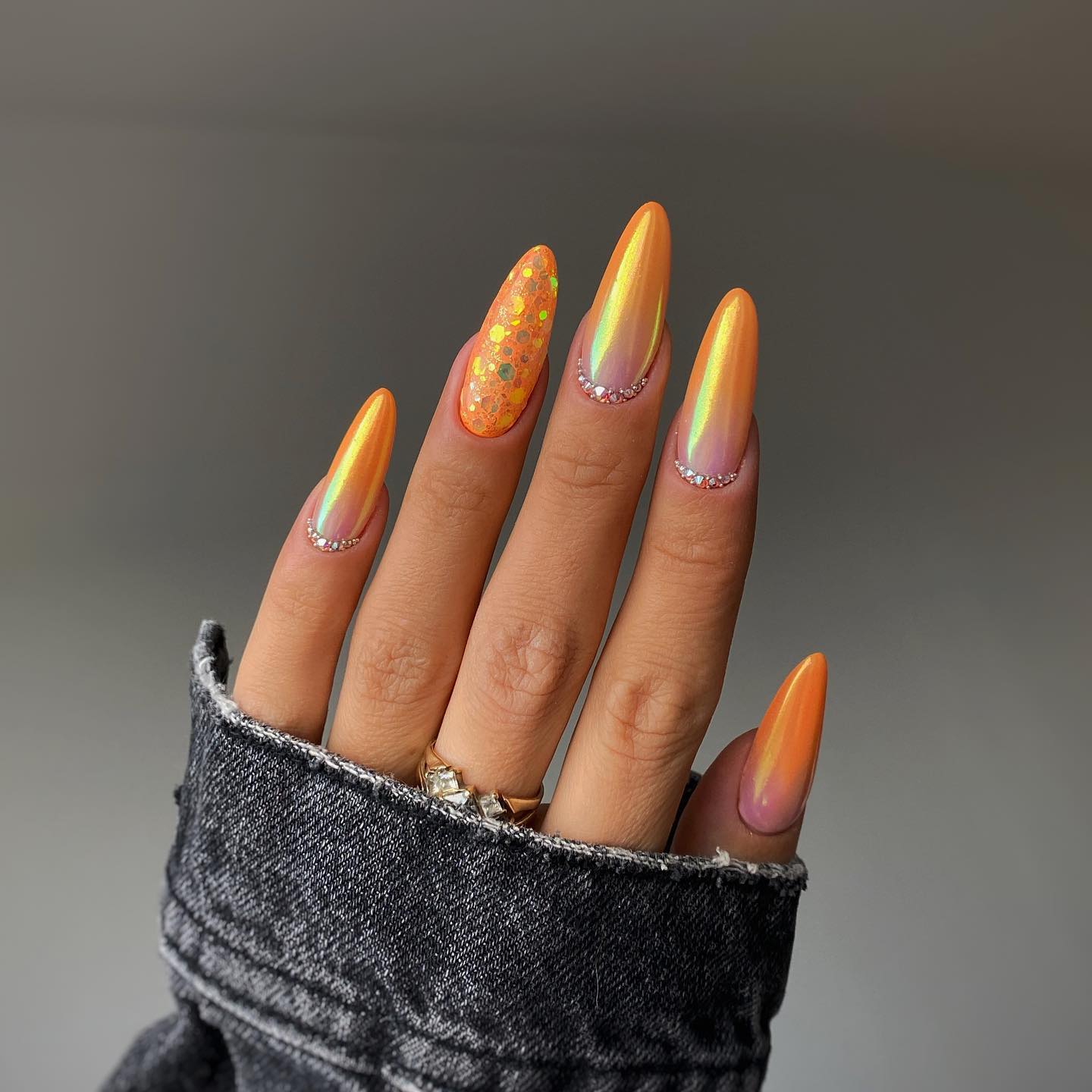 Long Round Chrome Orange Nails with Rhinestones