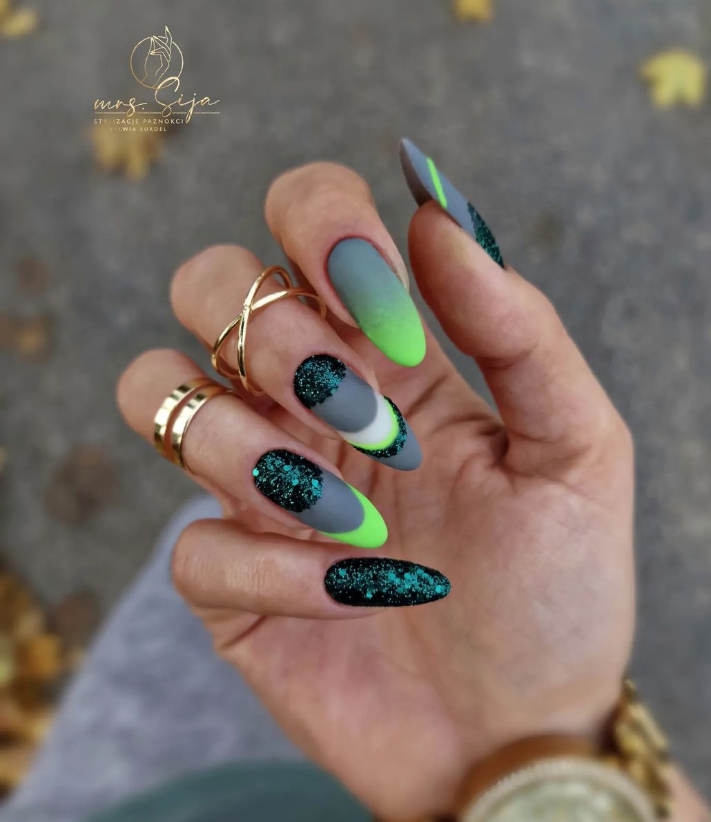 Long Round Green Nails with Dark Glitter Design