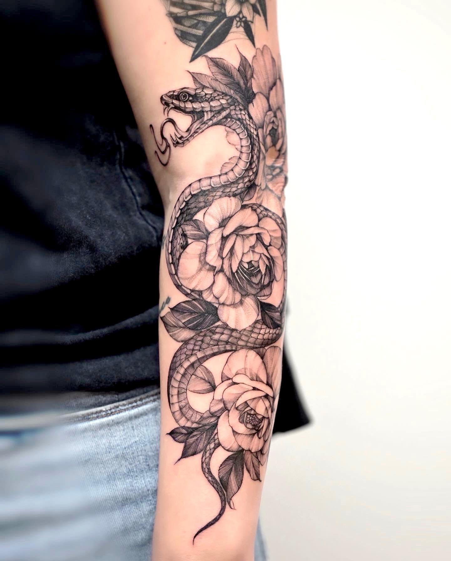 Black Cobra with Roses Tattoo on Arm