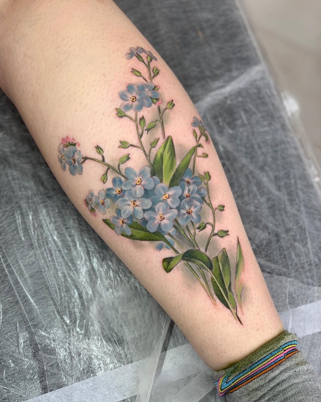 Color Forget Me Not Tattoo on Leg