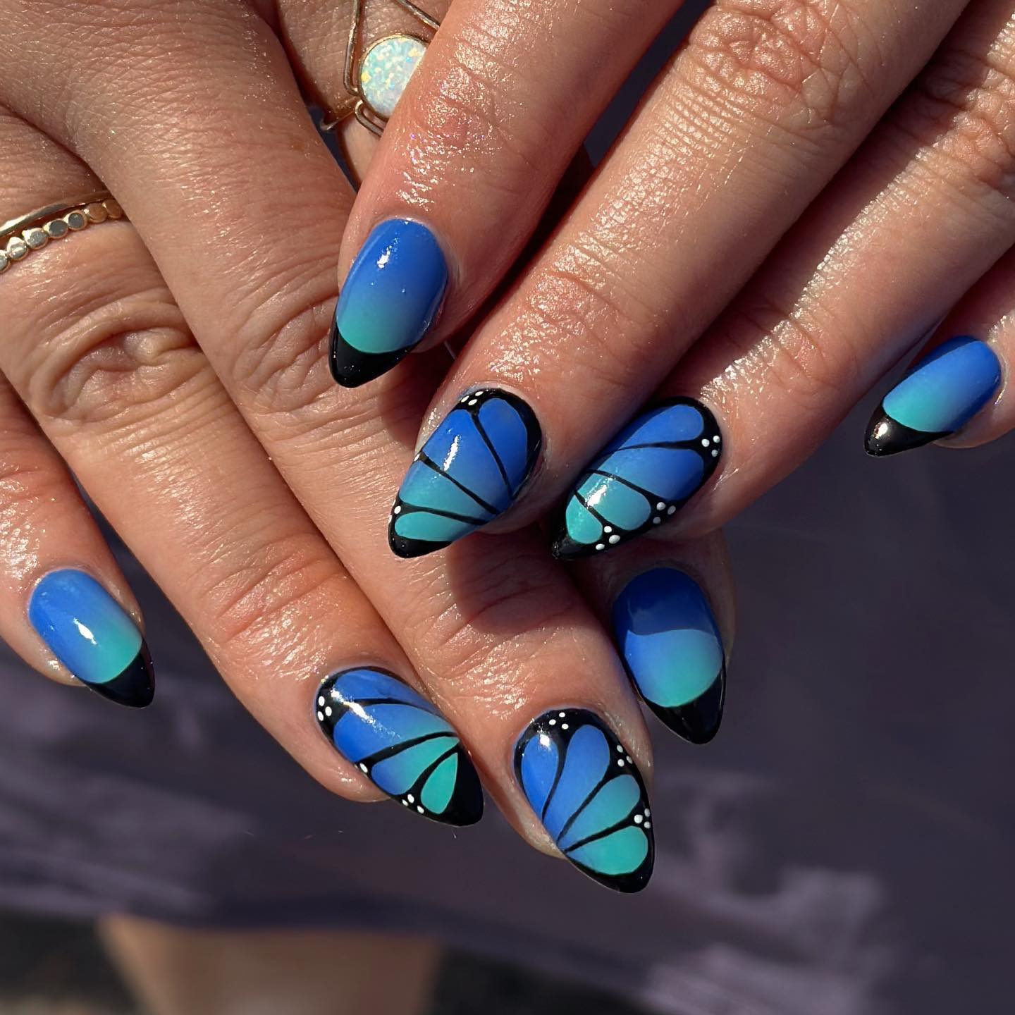 Dark Blue Nails with Butterfly Wing Design