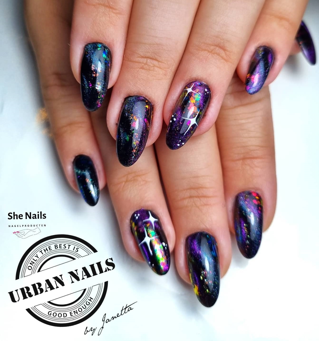 Short Round Multicolor Galaxy Nails with White Stars