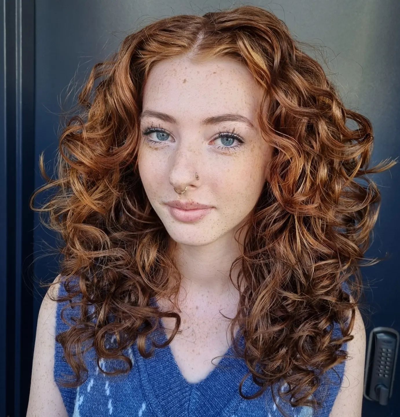 Butterfly Haircut on Curly Copper Hair