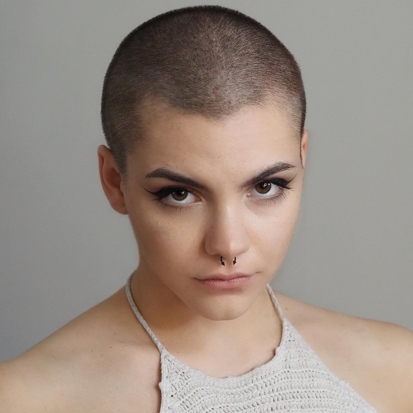 Classic Buzz Cut for Women on Dark Hair