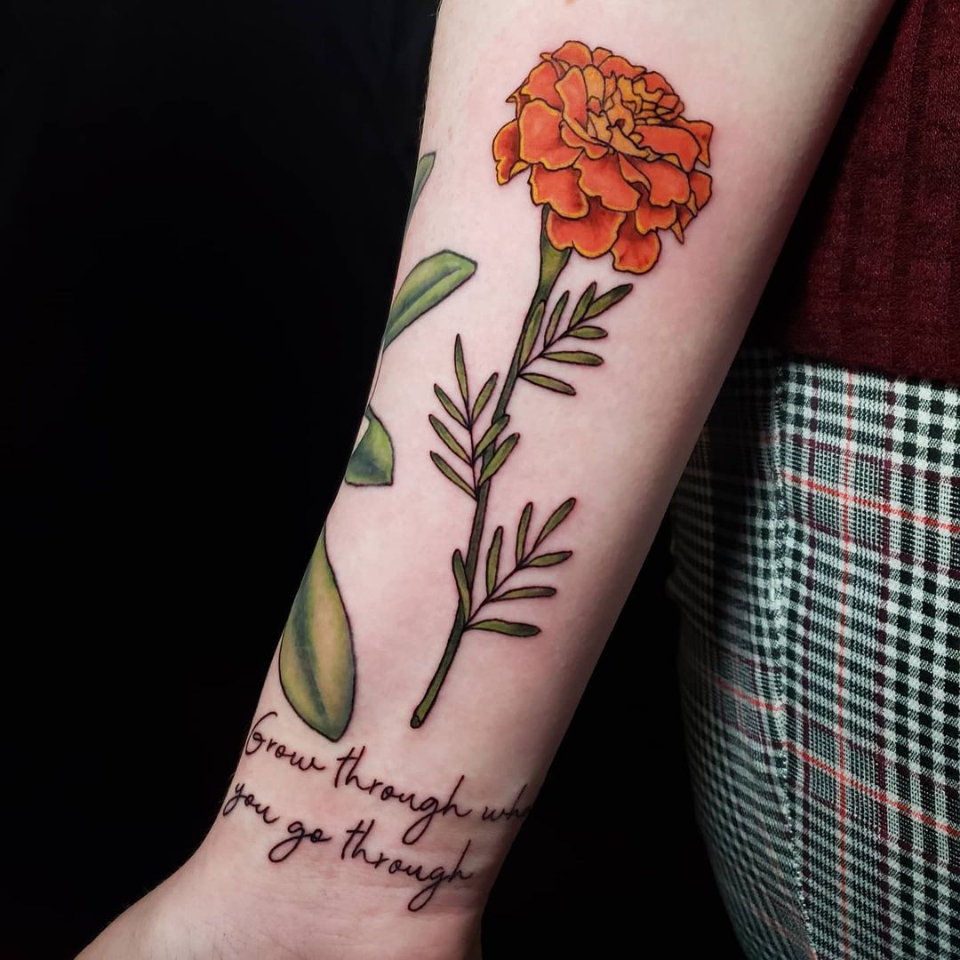 Idylllic Minimalist Marigold Tattoo