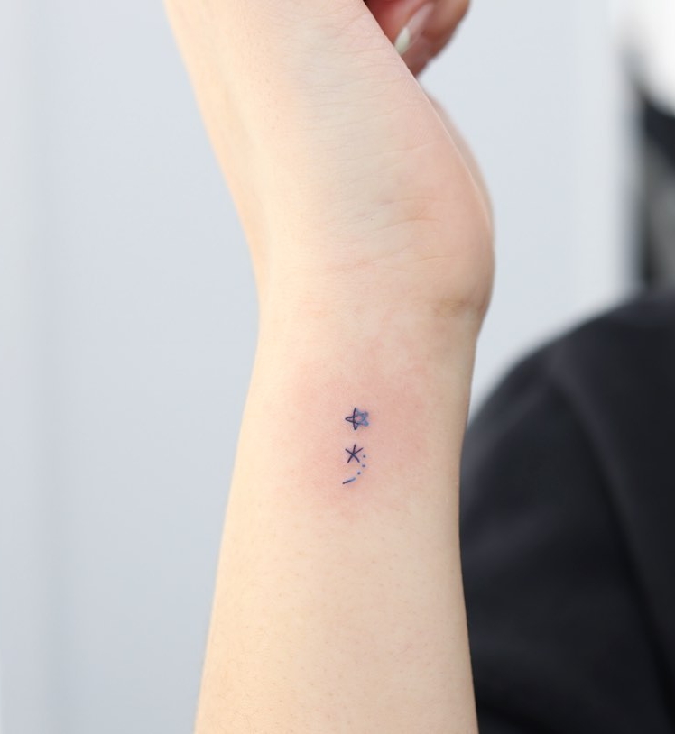 Semicolon Tattoo in the Form of Stars on Wrist