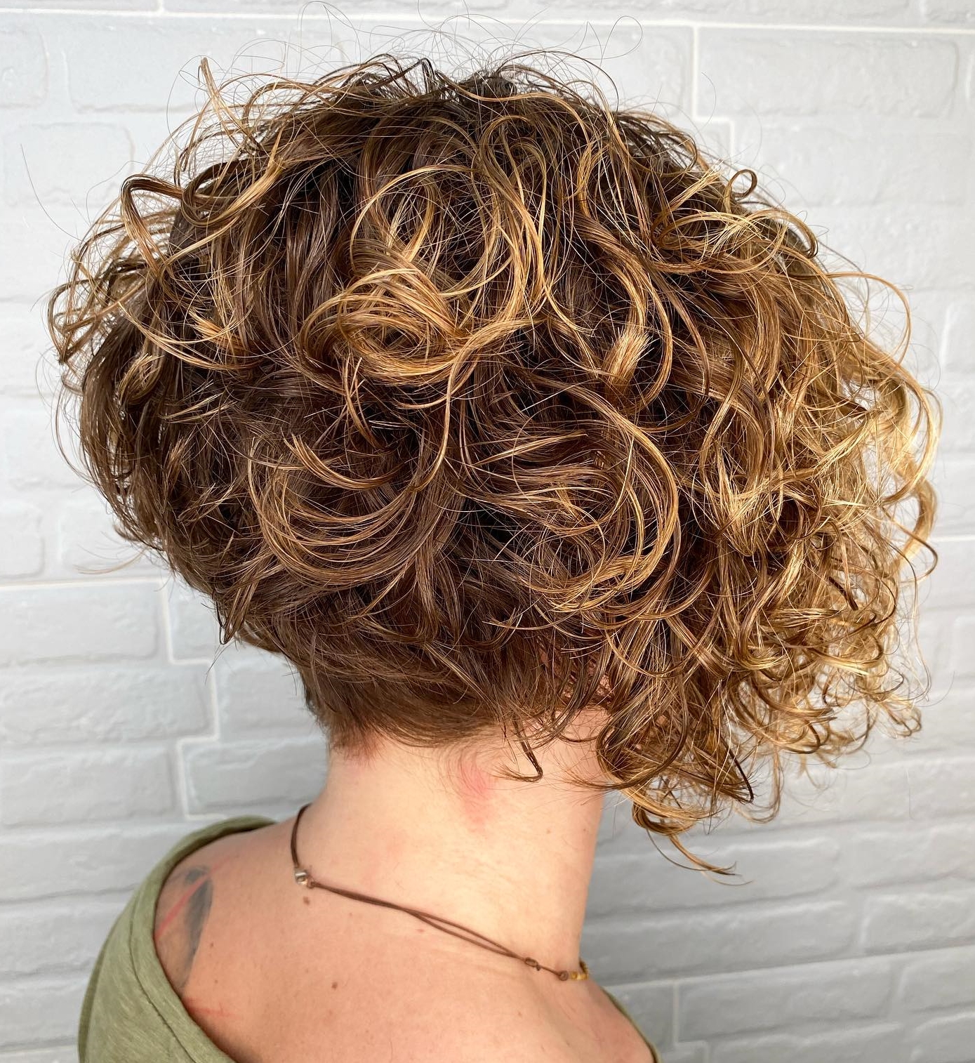 Stacked Short Curly Bob Cut with Blonde Highlights