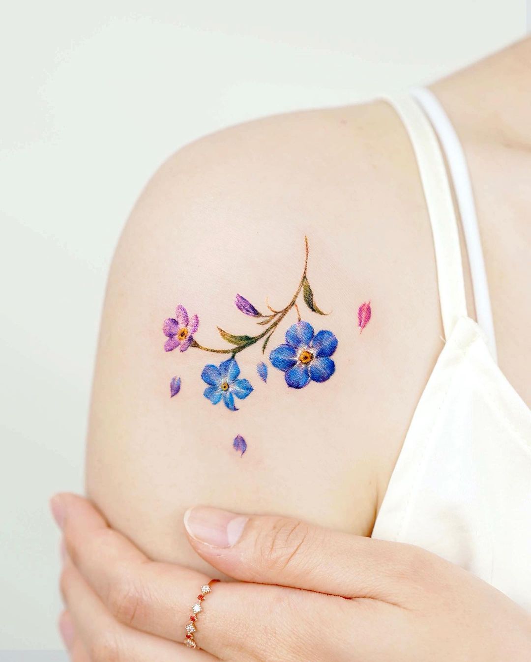 Blue and Purple Forget Me Not Tattoo on Shoulder