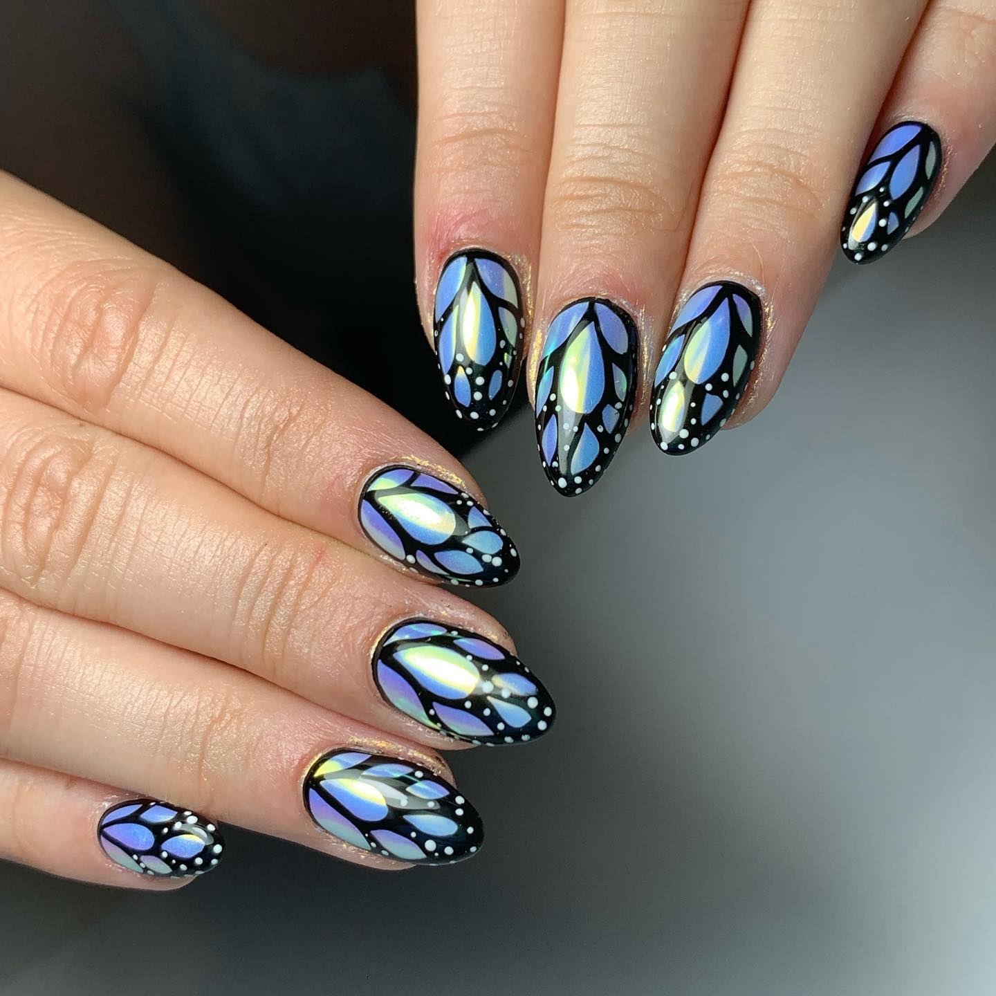 Blue Nails with Chrome Butterfly Wing Design