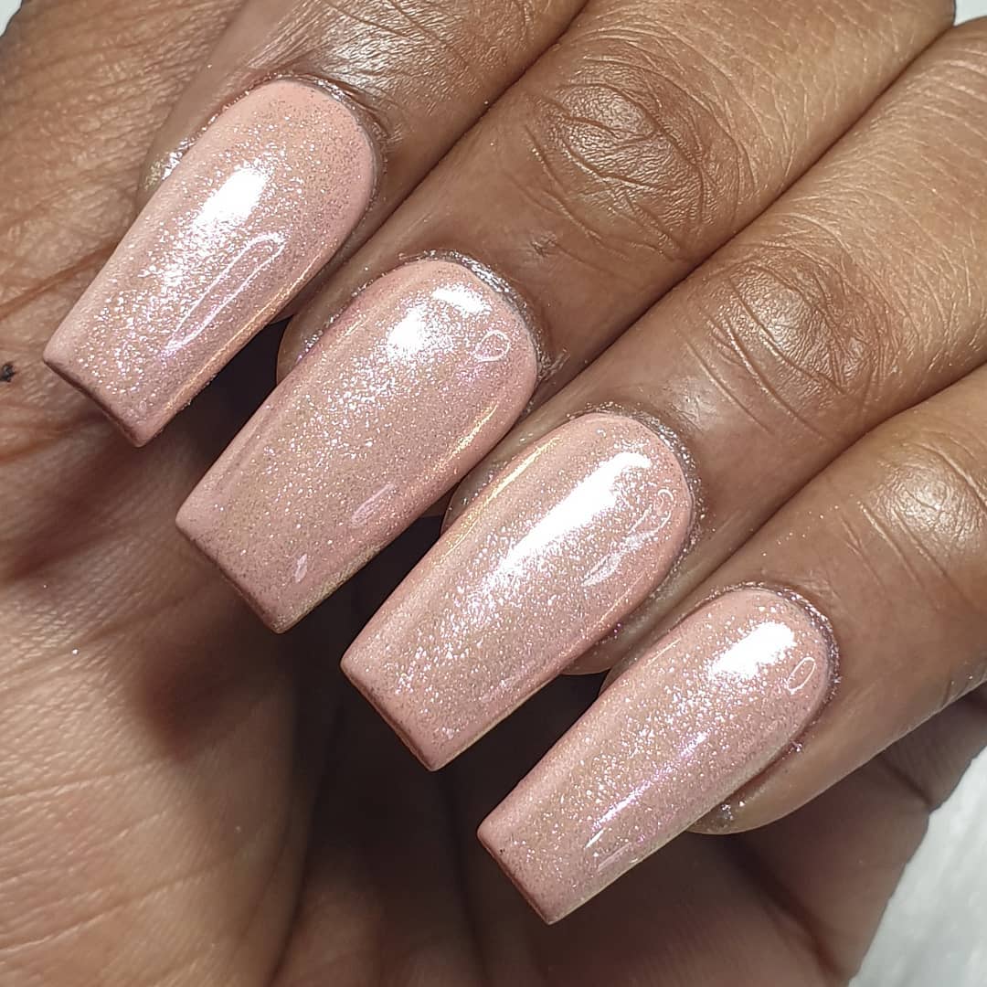 Nude chrome nails for a futuristic look