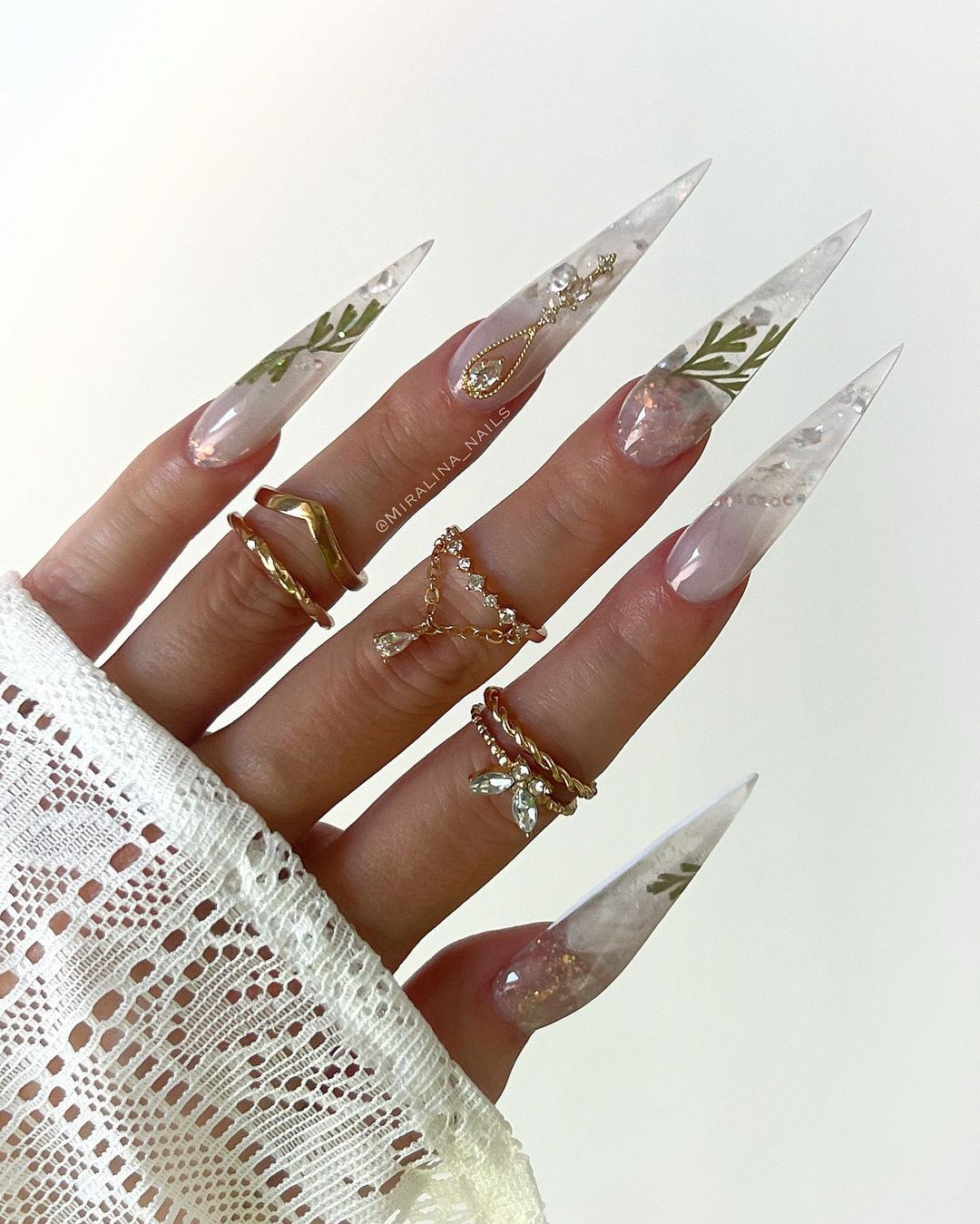 Long White Stiletto Nails with Leaves