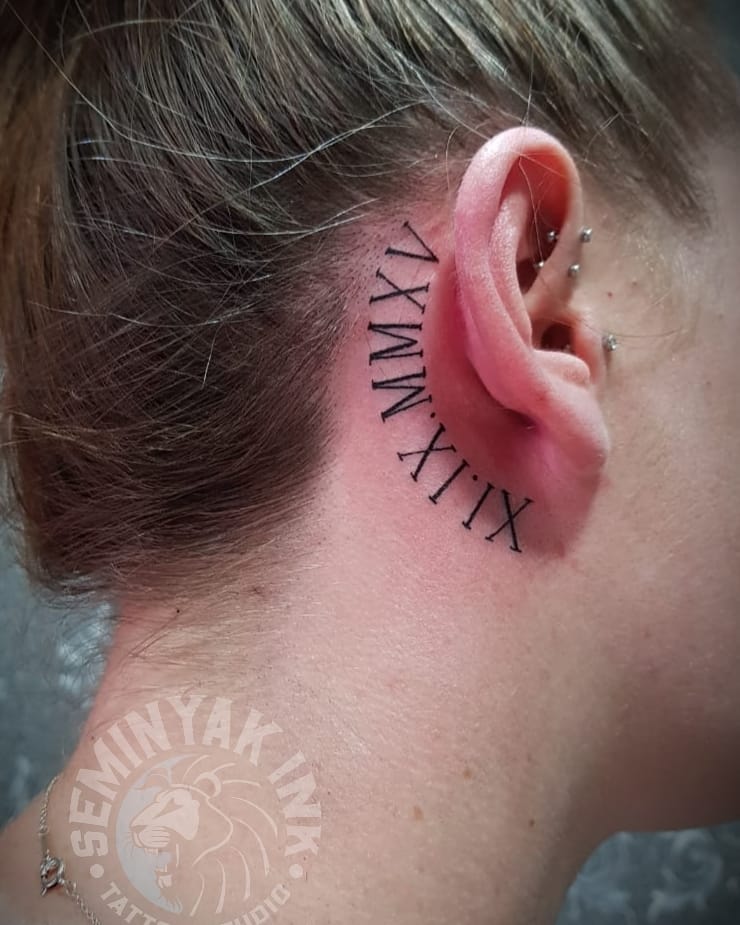 Roman Numerals Tattoo Behind Ear for Women