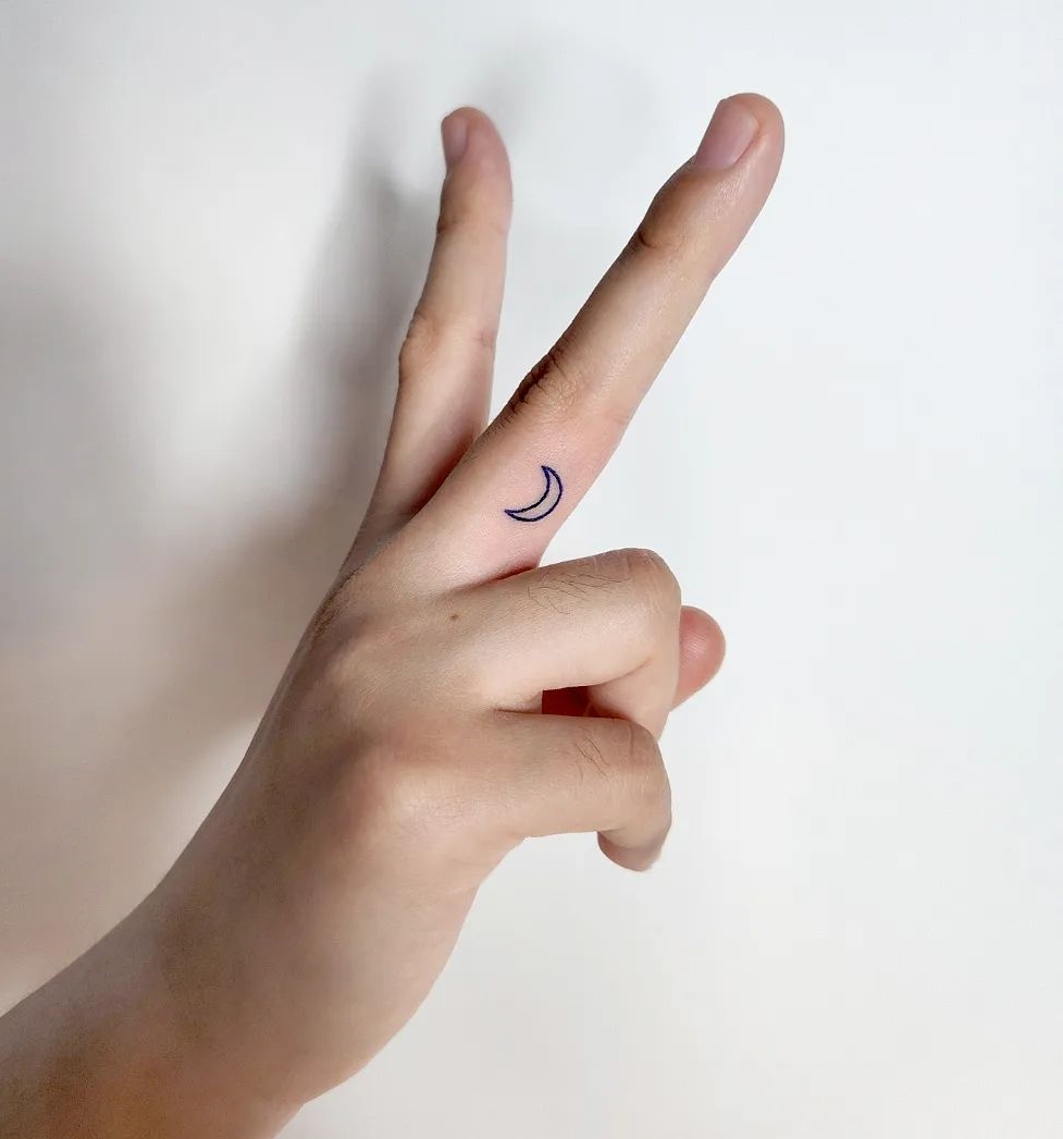 Small New Moon Tattoo Inside Middle Finger