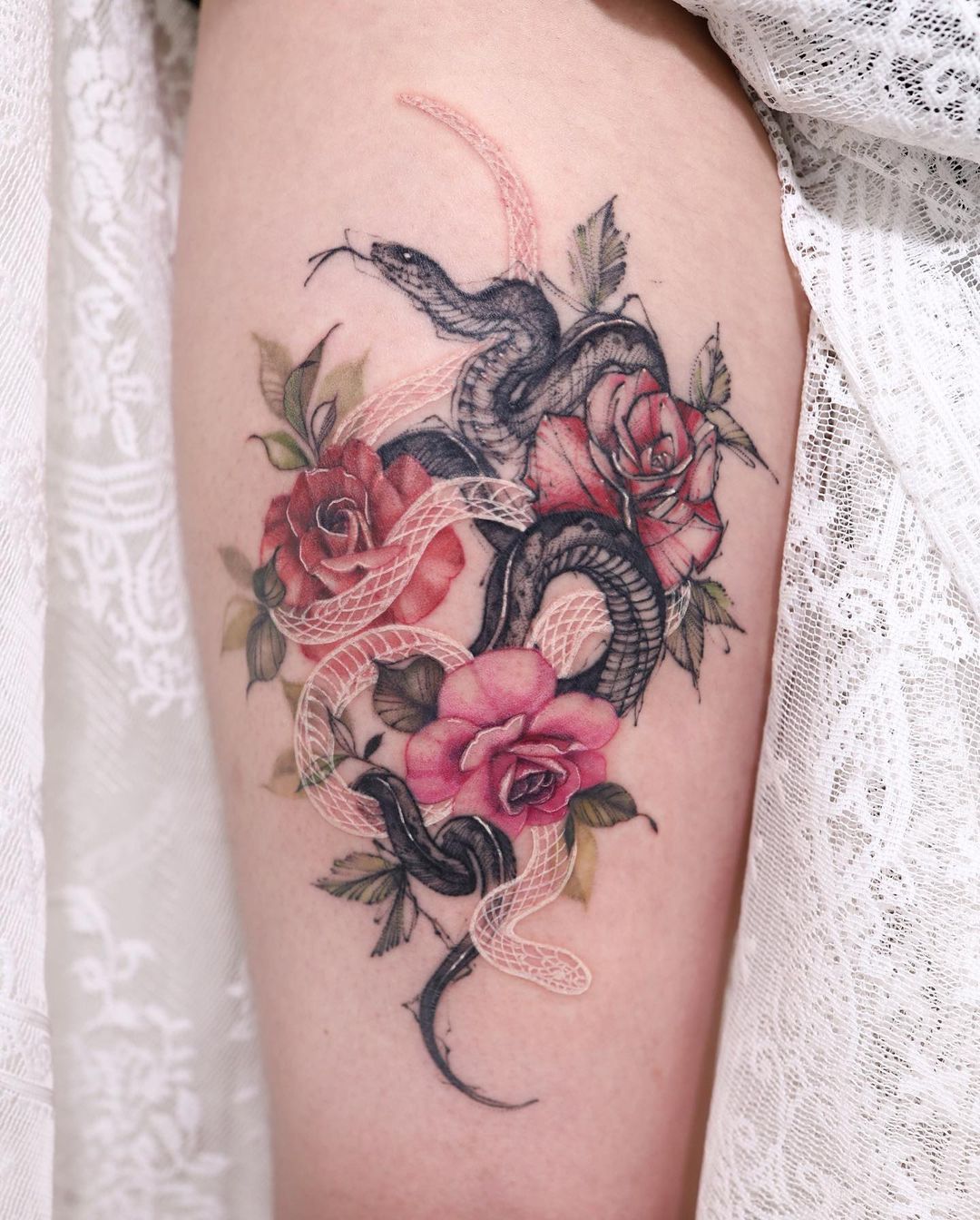 Snake and Red Rose Tattoo on Arm