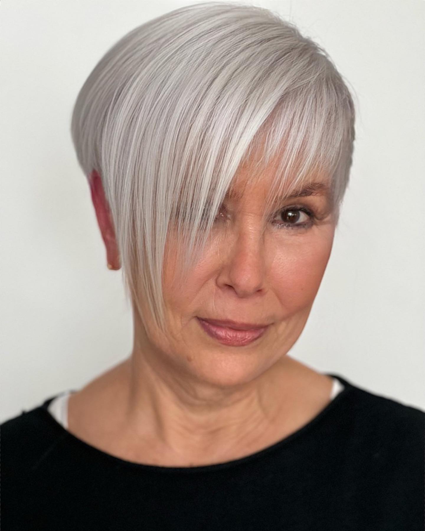 Asymmetrical Pixie on Blonde Hair with Extra Long Bang
