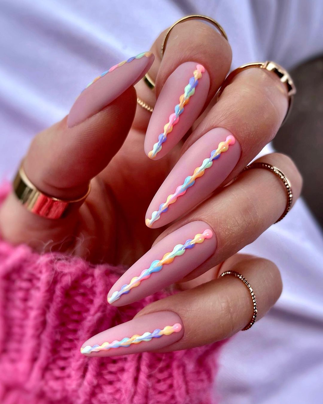 long Nude Almond Nails with Colourful Spots