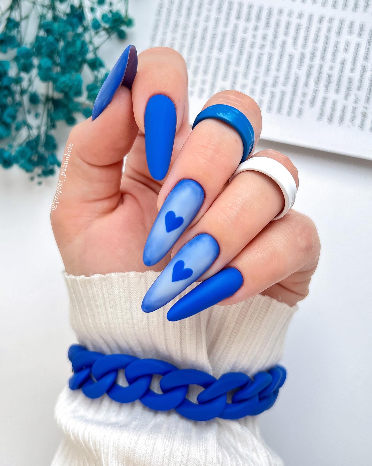 Long Matte Blue Nails with Heart Design