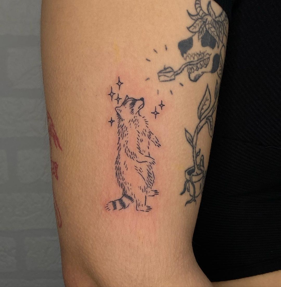 Symbolic Minimalist Raccoon Tattoo