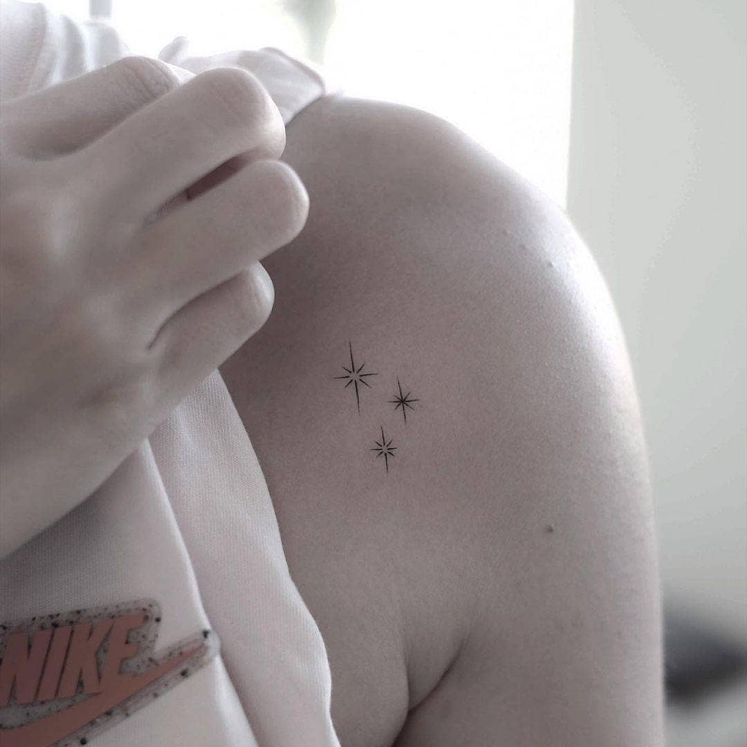 Subtle Minimalist Star Tattoo