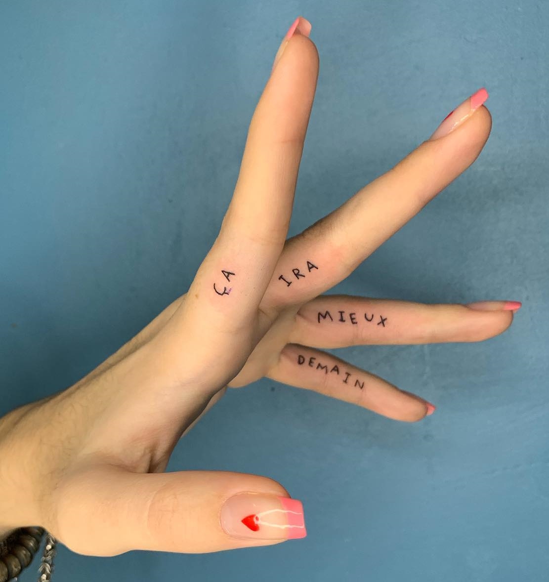 Name Tattoos Inside Each Finger