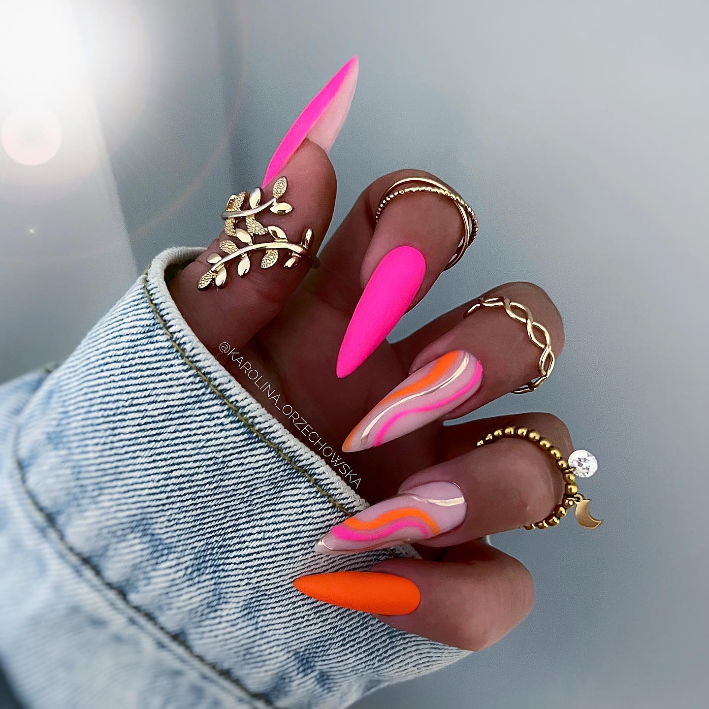 Bright Pink Stiletto Nails with Colorful Lines