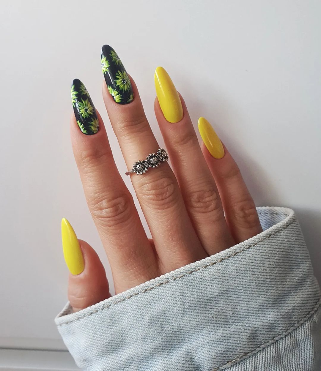 Long Round Black and Yellow Nails with Floral Design