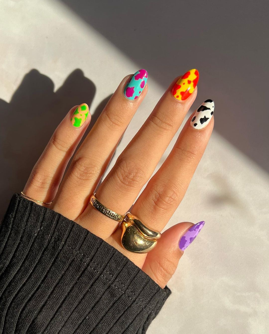 Almond Neon Nails with Cow Print