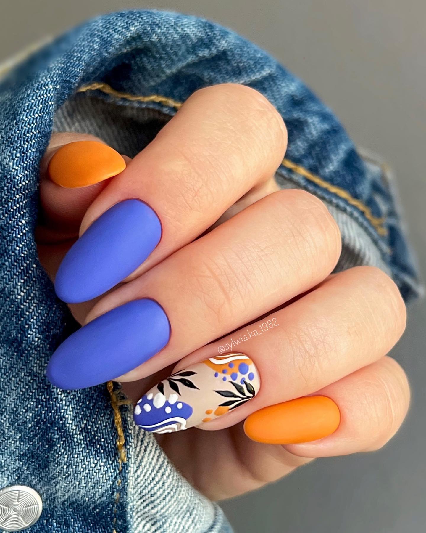 Round Orange and Blue Matte Nails