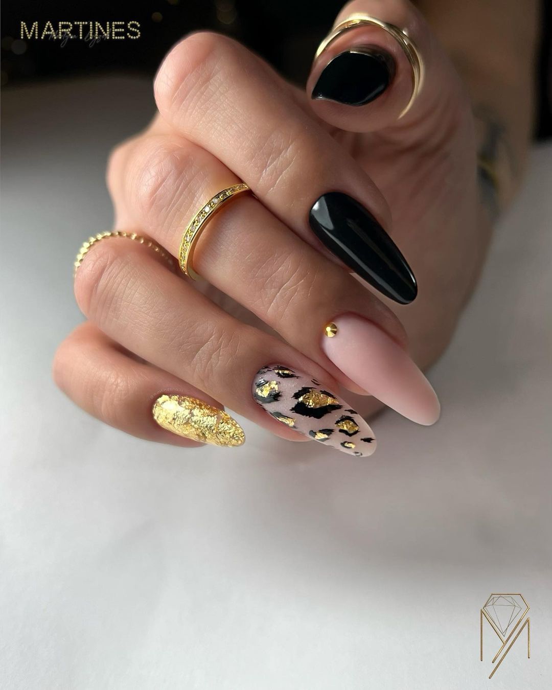 Black Glossy Nails with Gold Foil Design