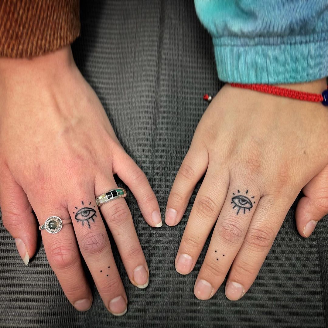 Couple Finger Tattoo Designs For A Sleek And Elegant Look