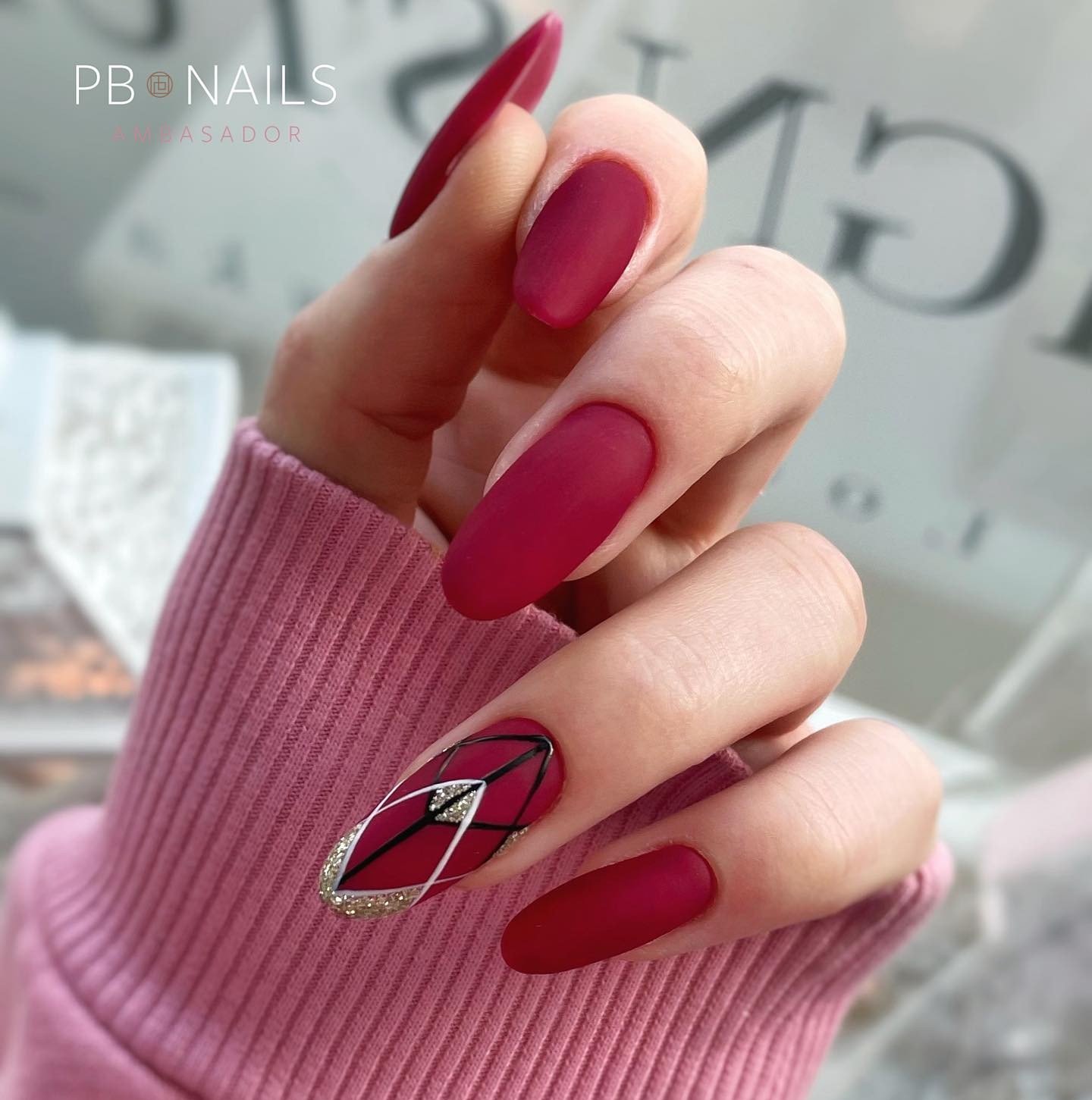 Long Matte Burgundy Nails with Accent Nail Design