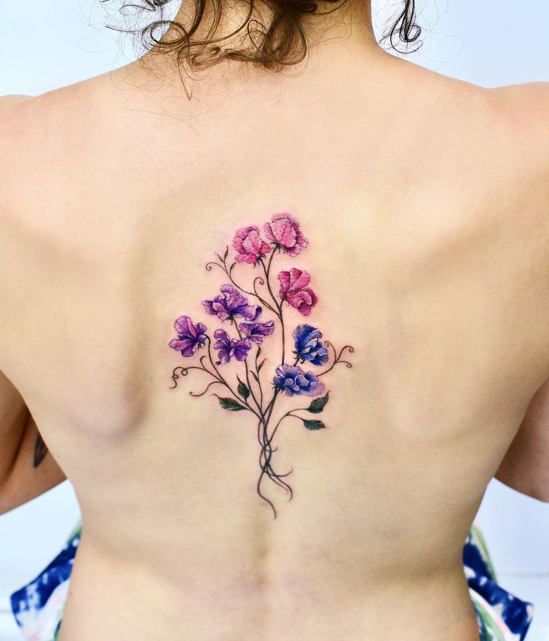 Color Sweet Pea Flower Tattoo on Back