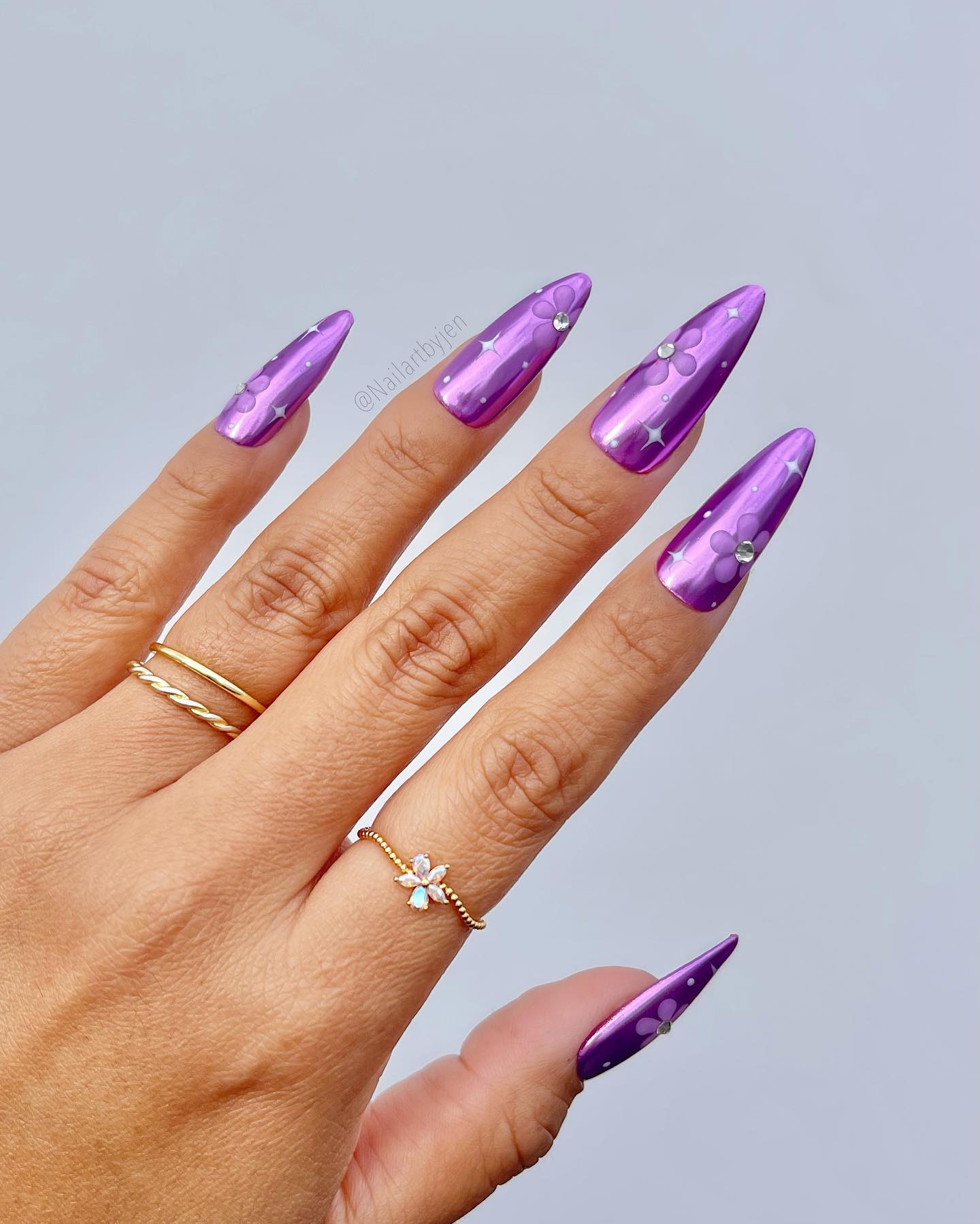 Long Purple Chrome Nails with Flower Design