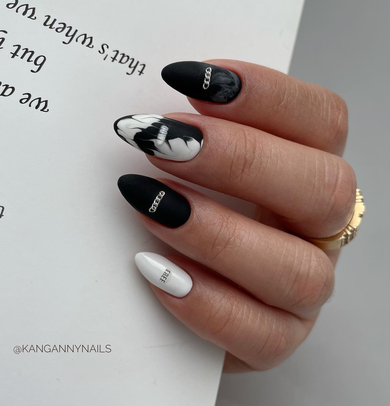 Black and White Almond Nails with Matte Finish