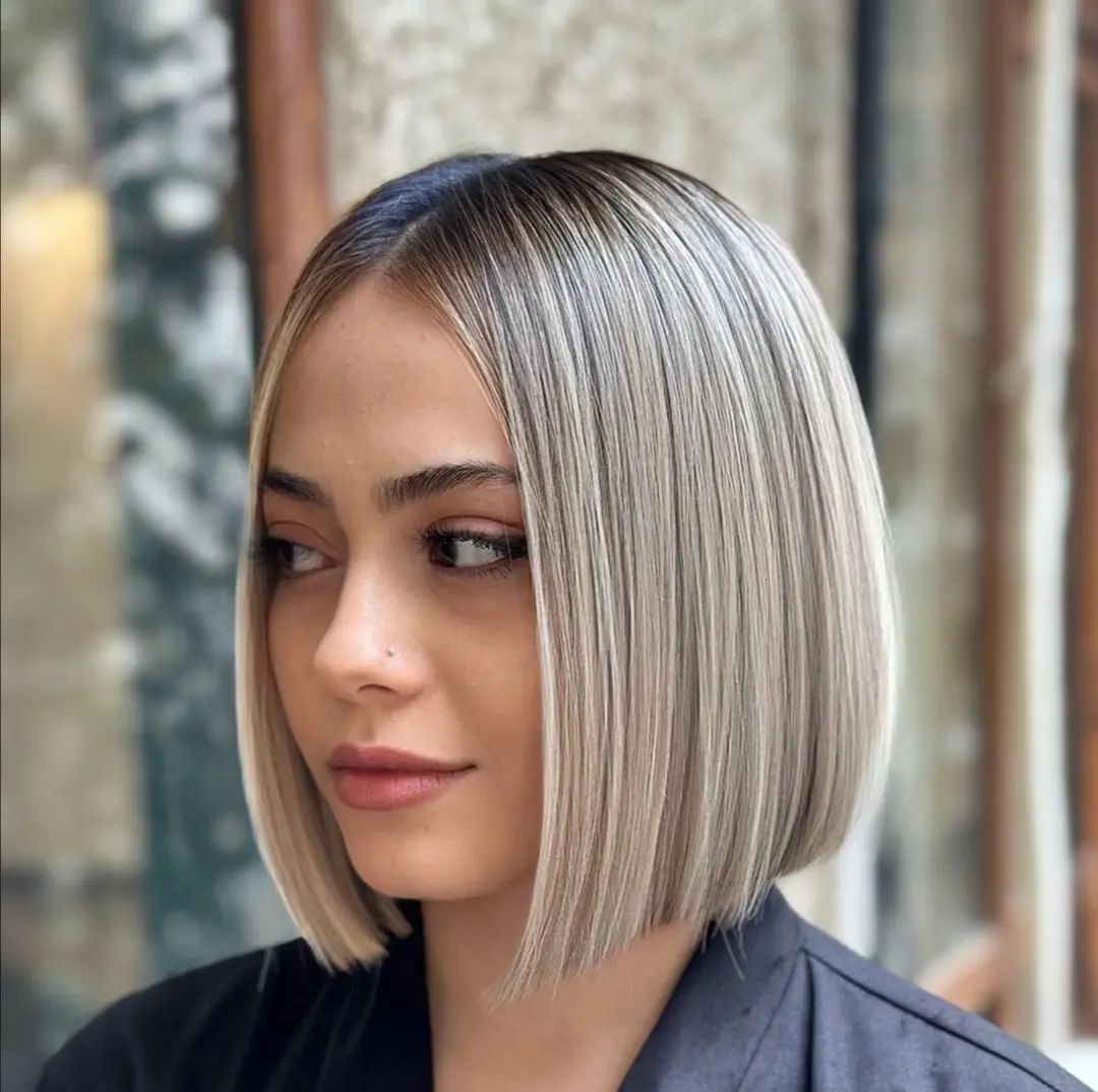 French Bob Cut with Blunt Ends on Blonde Hair