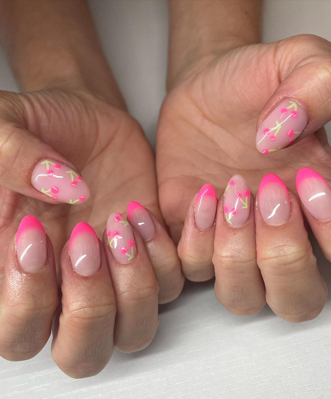 Short Pastel Pink Nails with Cherry Design