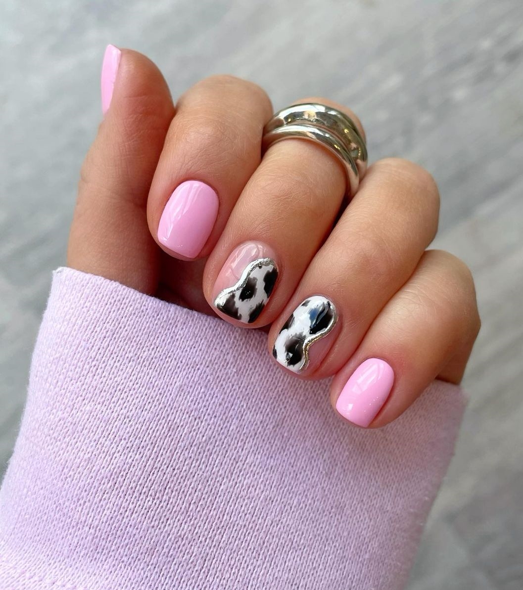 Short Pink Nails with Black and White Cow Print