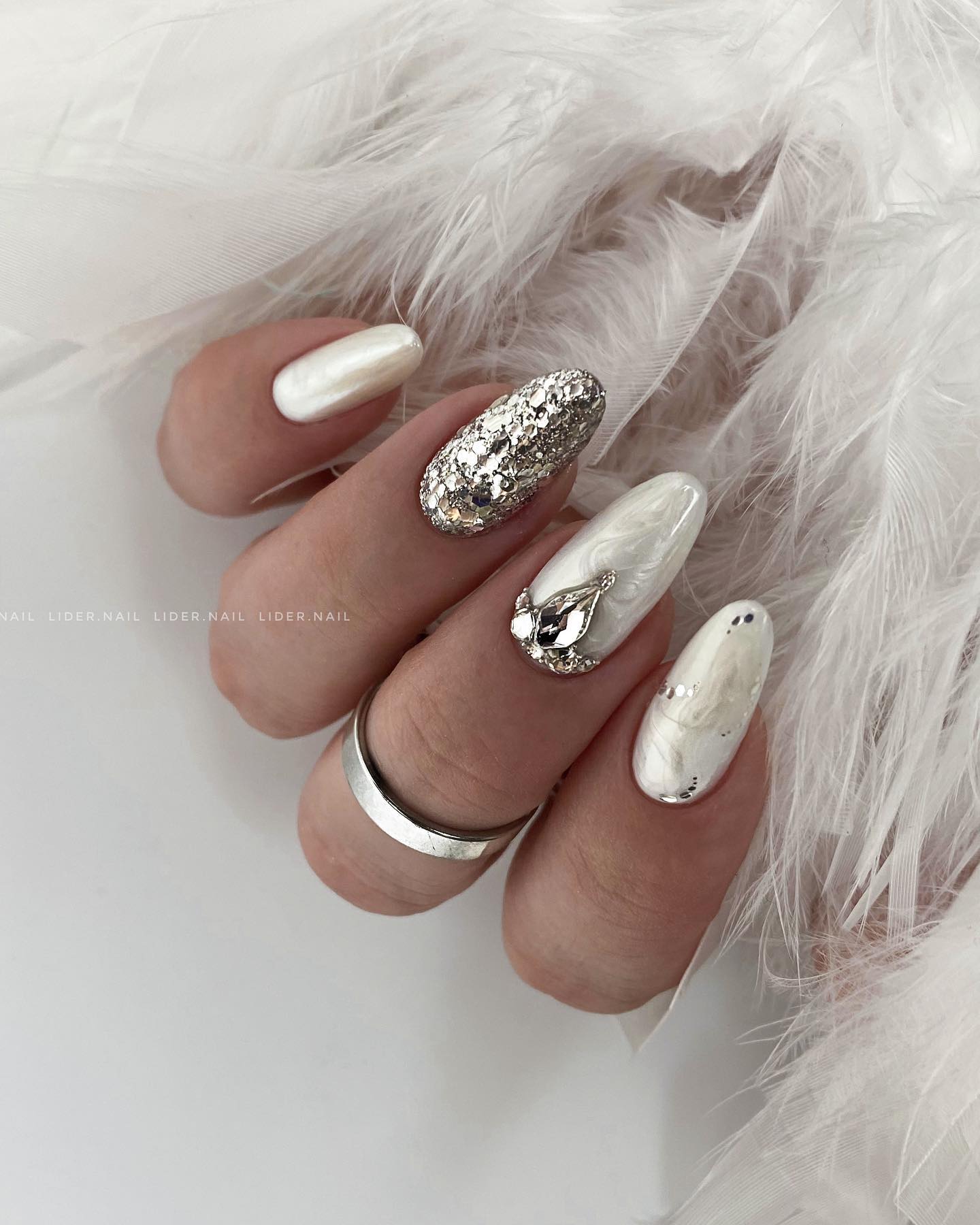 Short Round Nails with Marble Design and Rhinestones