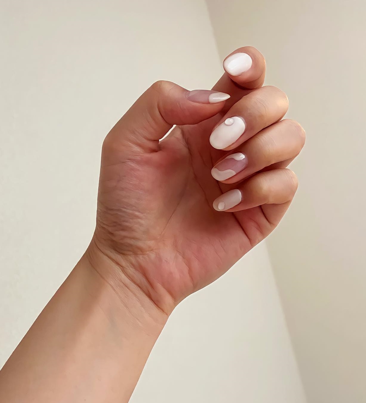 Short White Nails with Nude Polish Design
