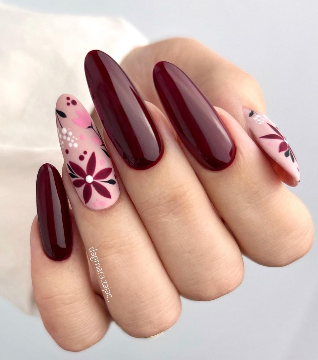 Long Almond Burgundy Nails with Floral Design