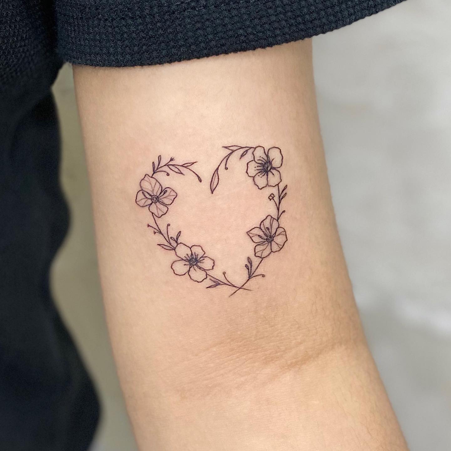 Black and White Flower Heart Tattoo on Arm