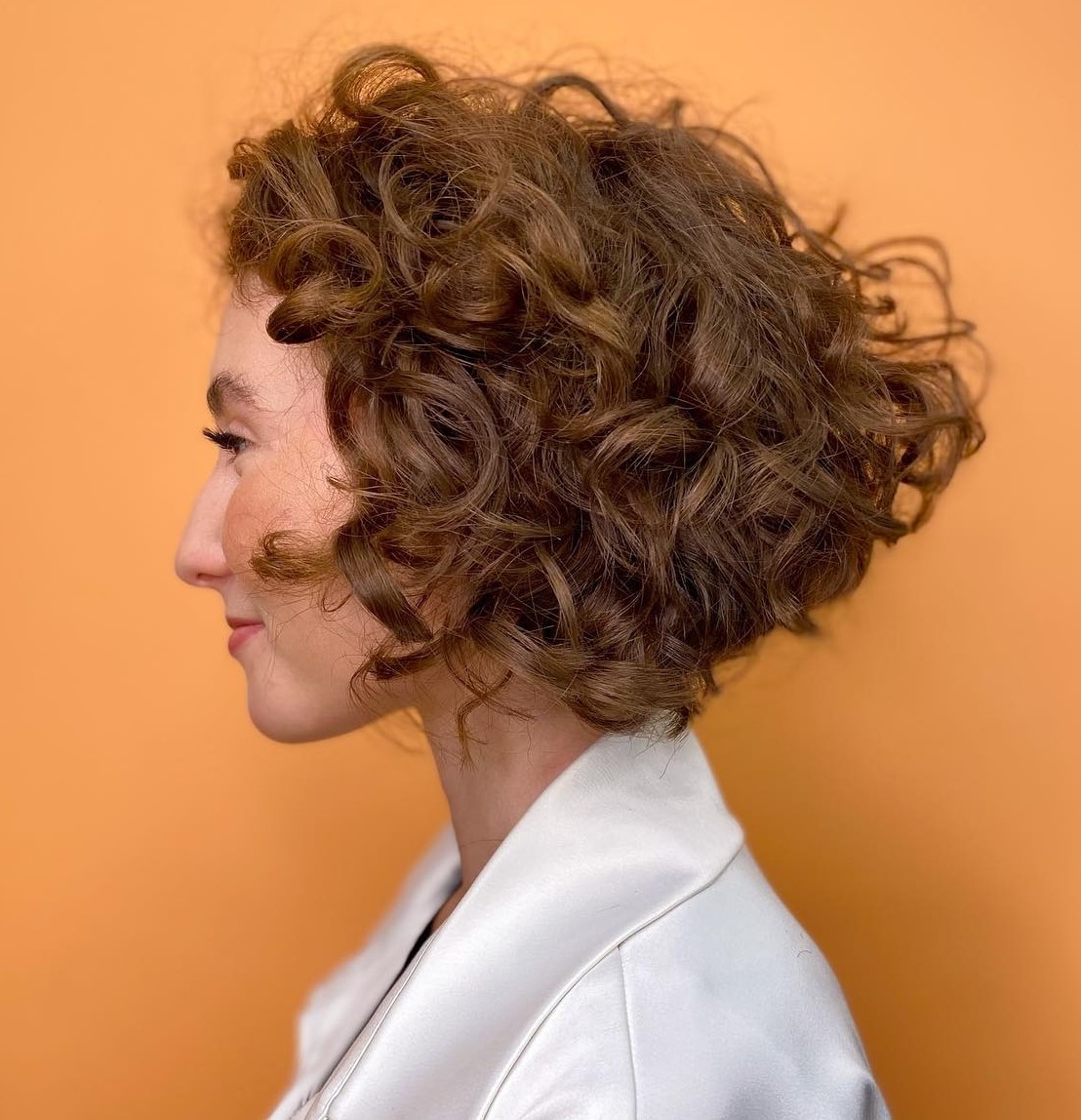 Inverted Curly Bob on Light Brown Hair