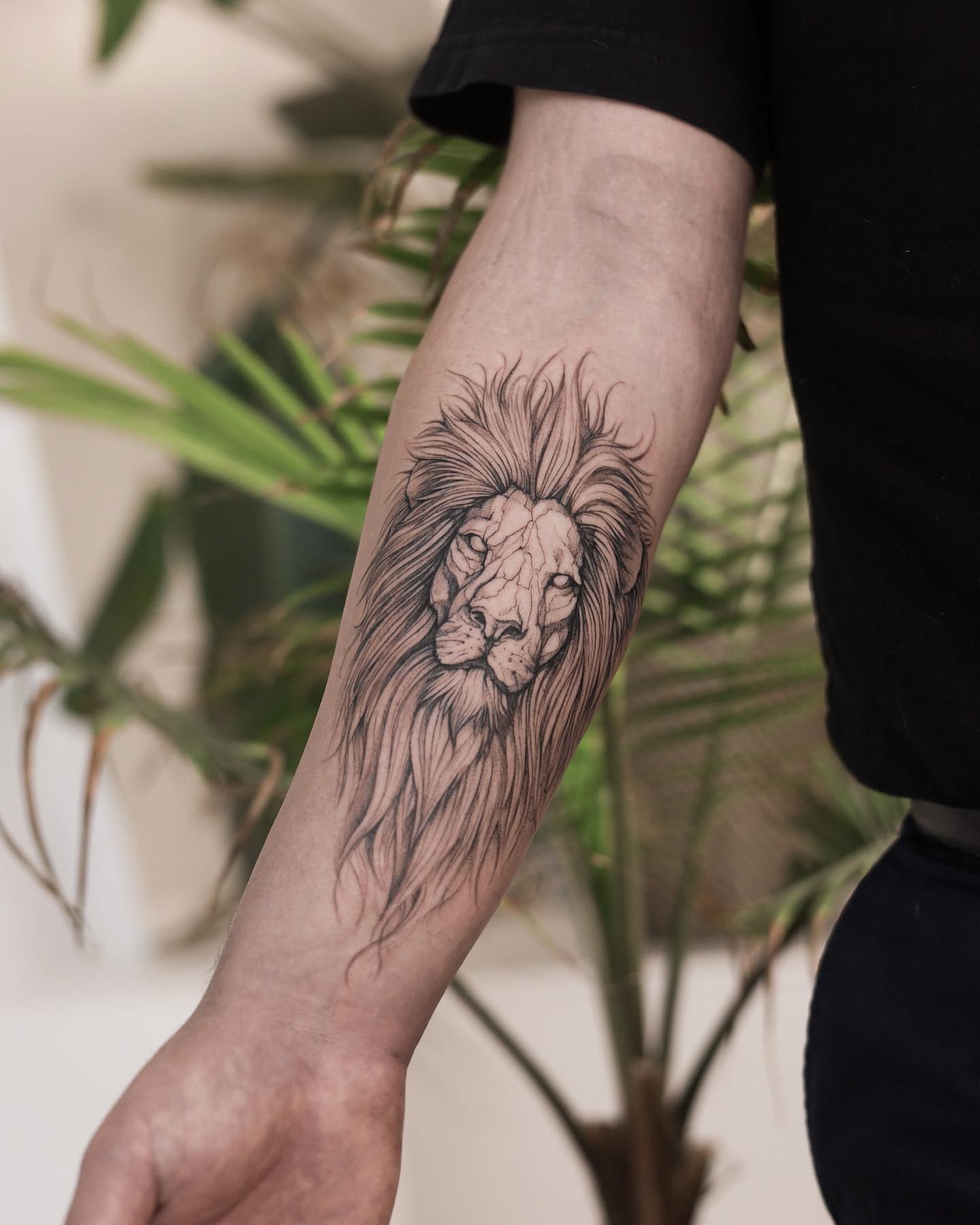 Lion Tattoo on Inner Arm