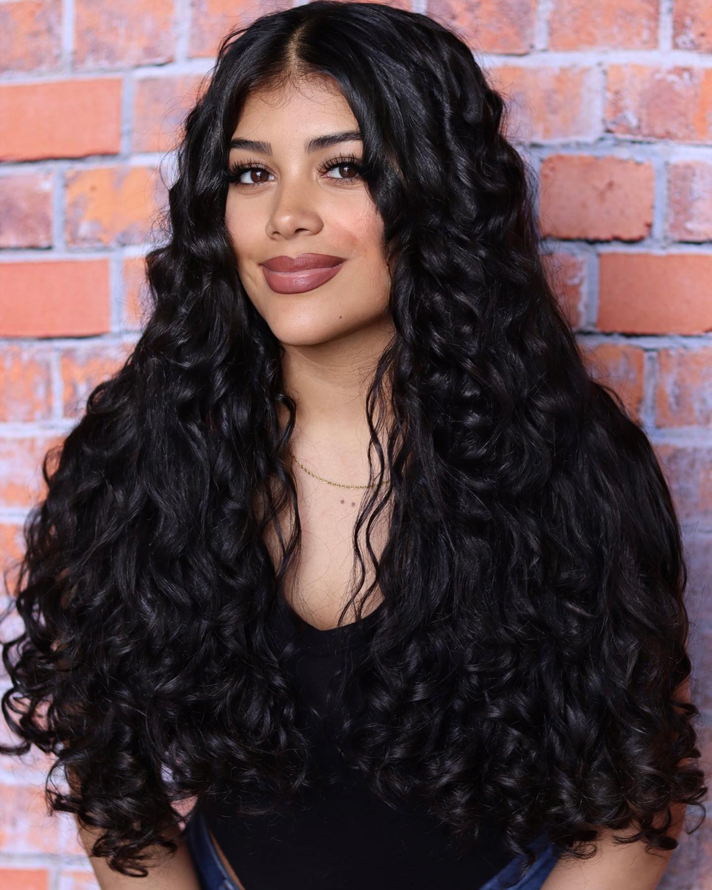 Long Curly Black Hairstyle for Heart-Shaped Face