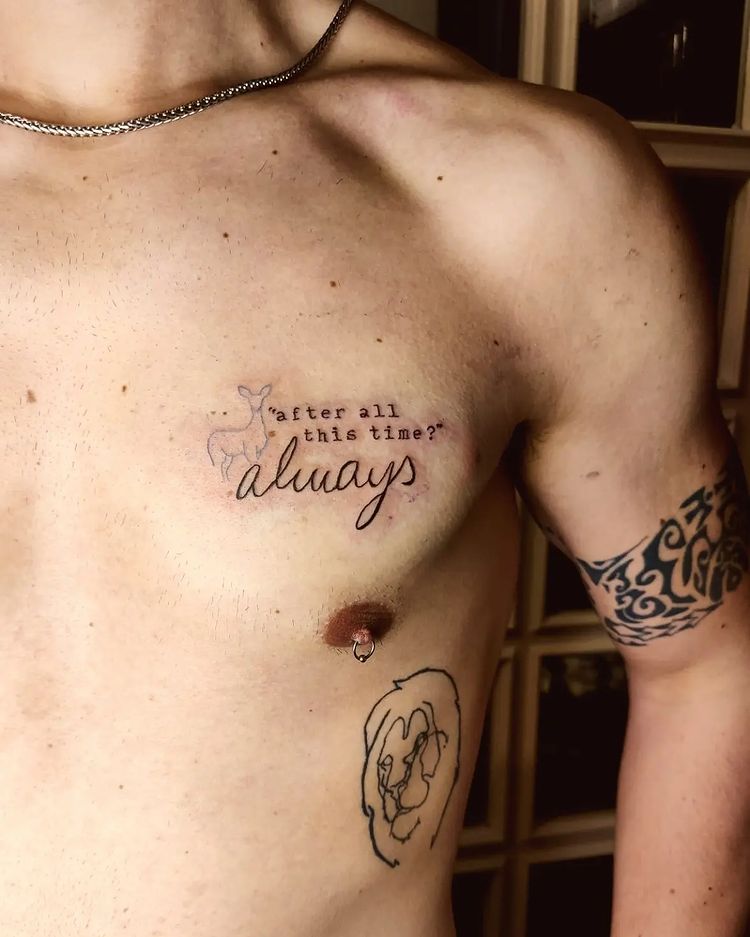 Black and White Quote Tattoo on Chest for Men