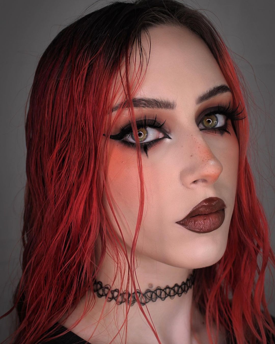 Emo Black and Brown Eye Makeup with False Lashes and Brown Lipstick