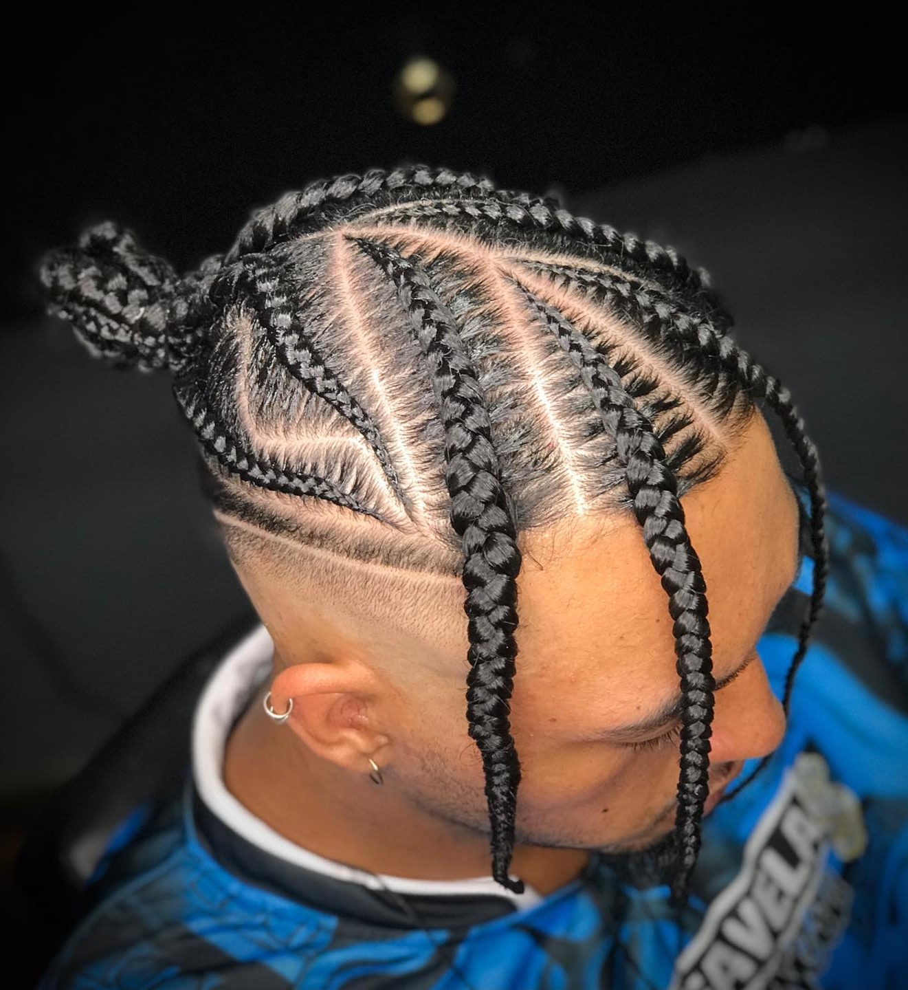 Four Stitch Braids for Men with Bun on Black Hair