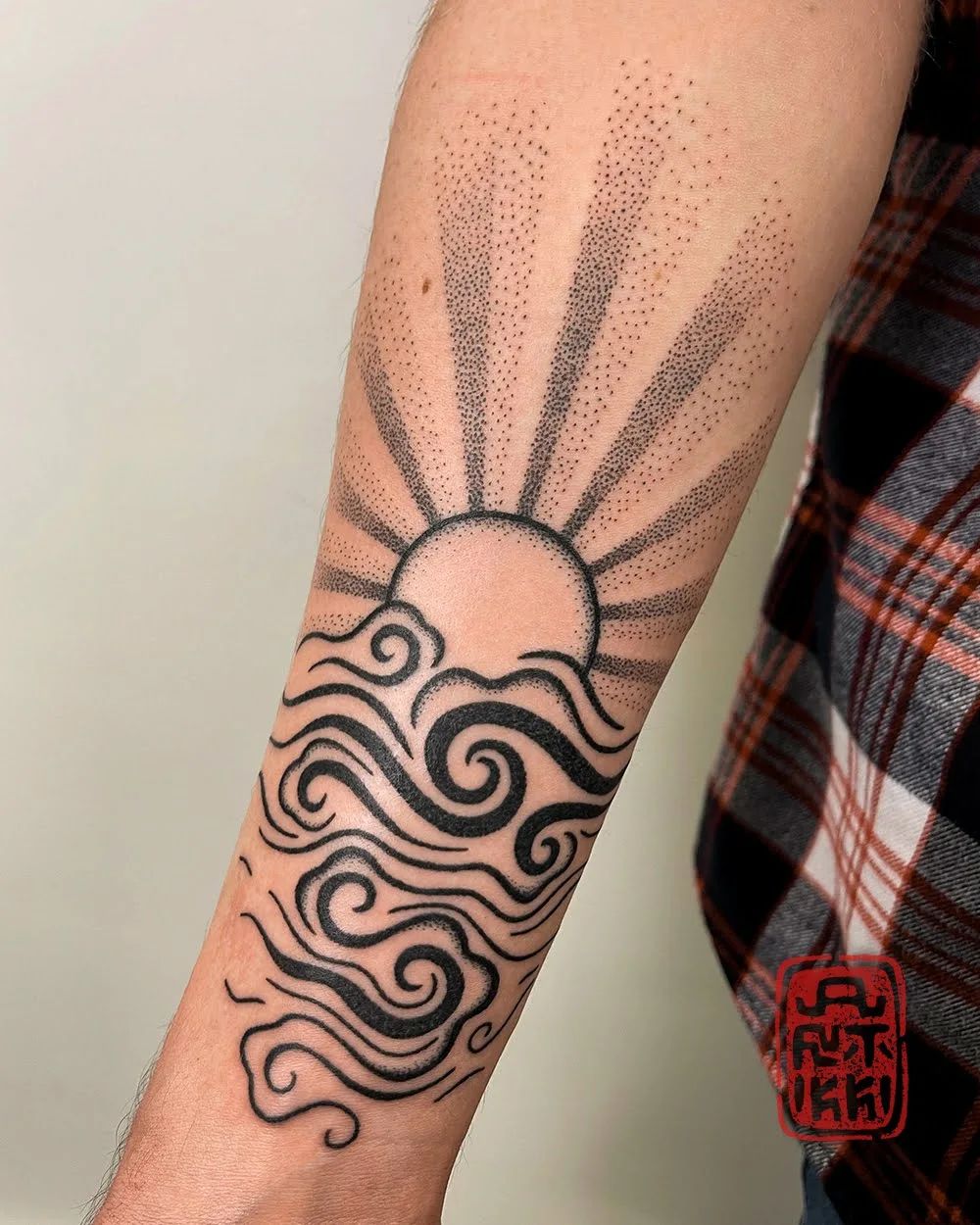 Rising Sun and Waves Tattoo on Arm