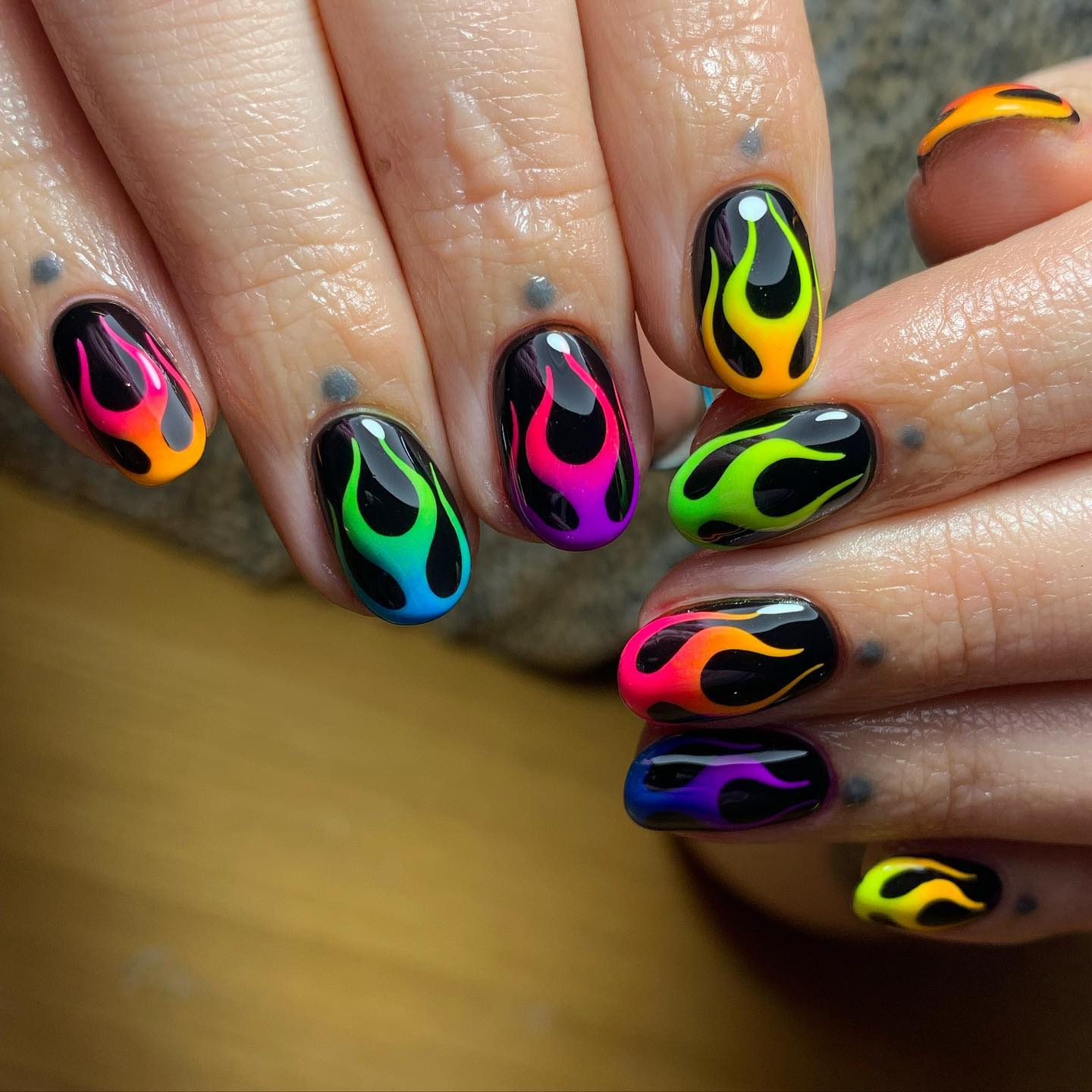 Short Black Nails with Neon Rainbow Flame Design