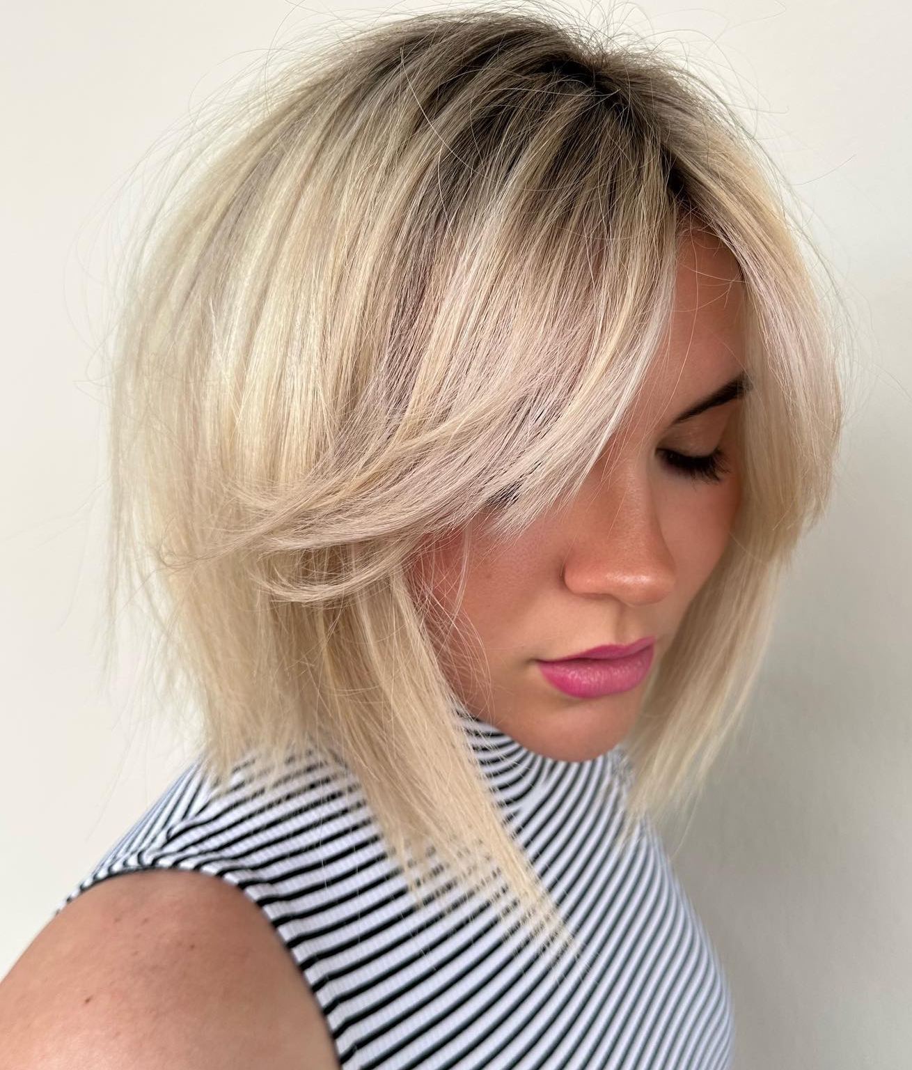 Bob Cut with Curtain Bang on Blonde Hair